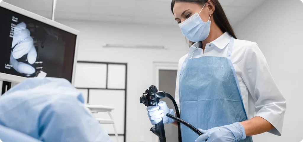Medical professional performing an endoscopic procedure